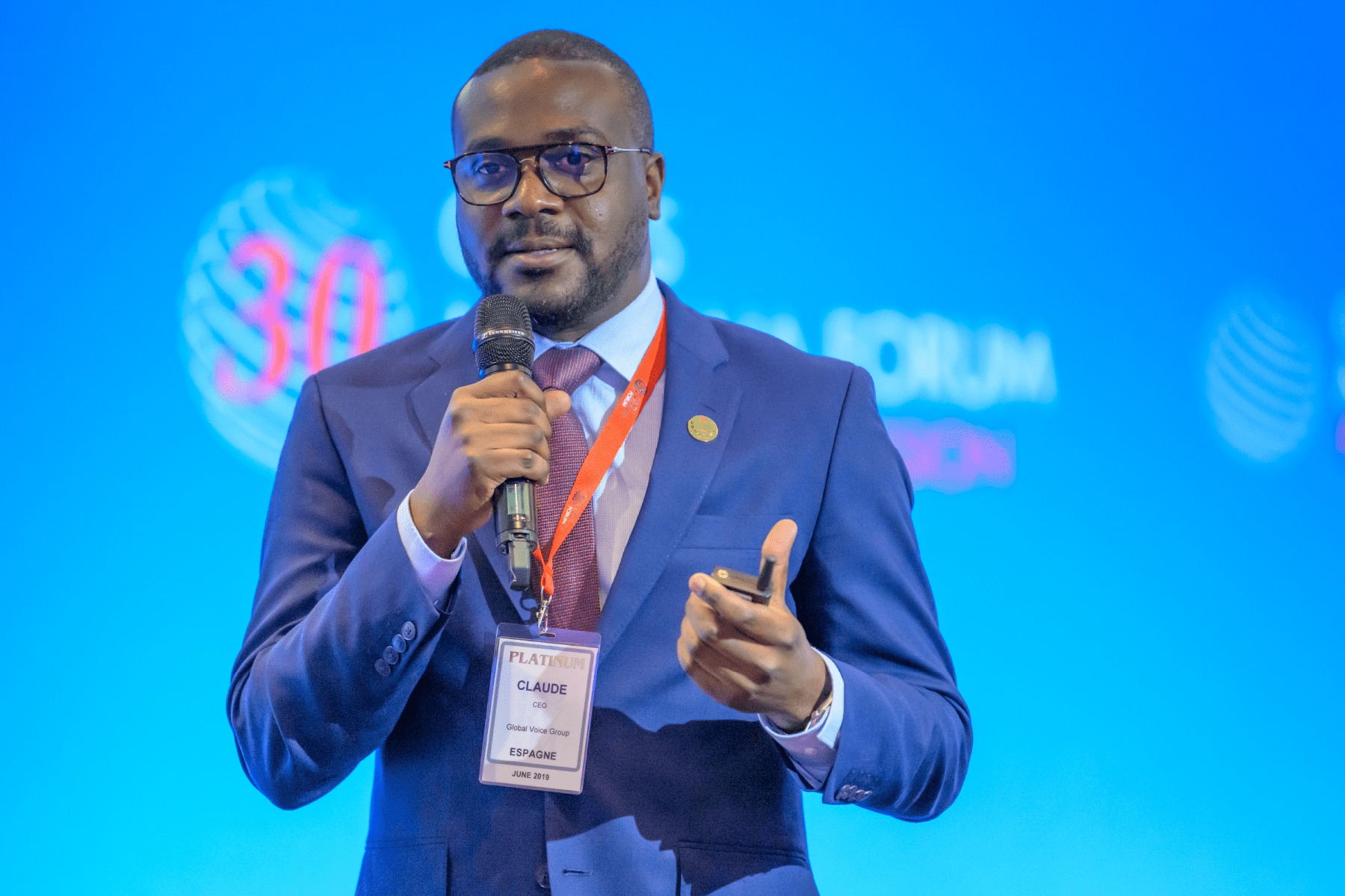 James Claude speaking as a panelist at the Crans Montana Forum 2019